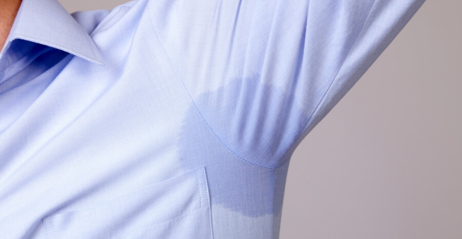 Man sweating through shirt