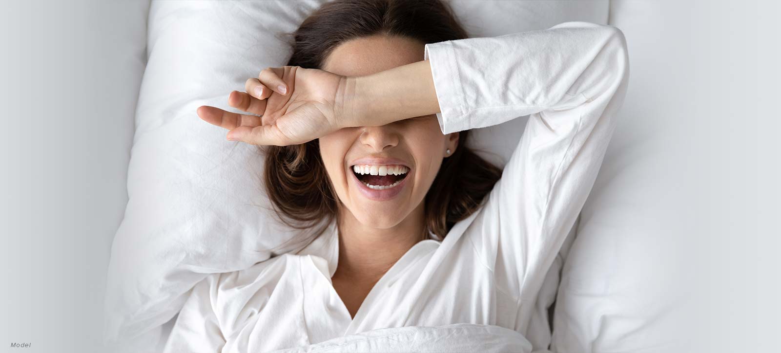 happy woman covering her eyes