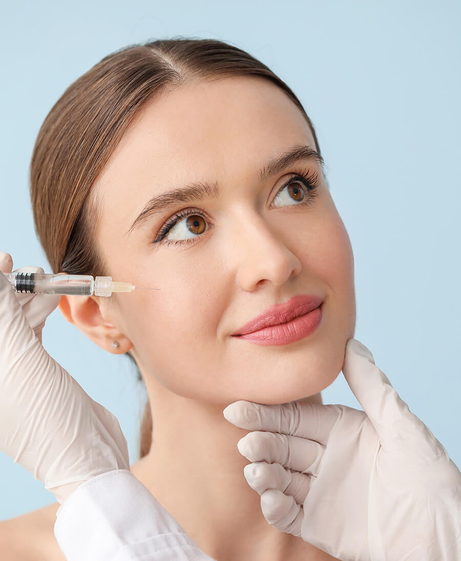 Woman getting cheek injections